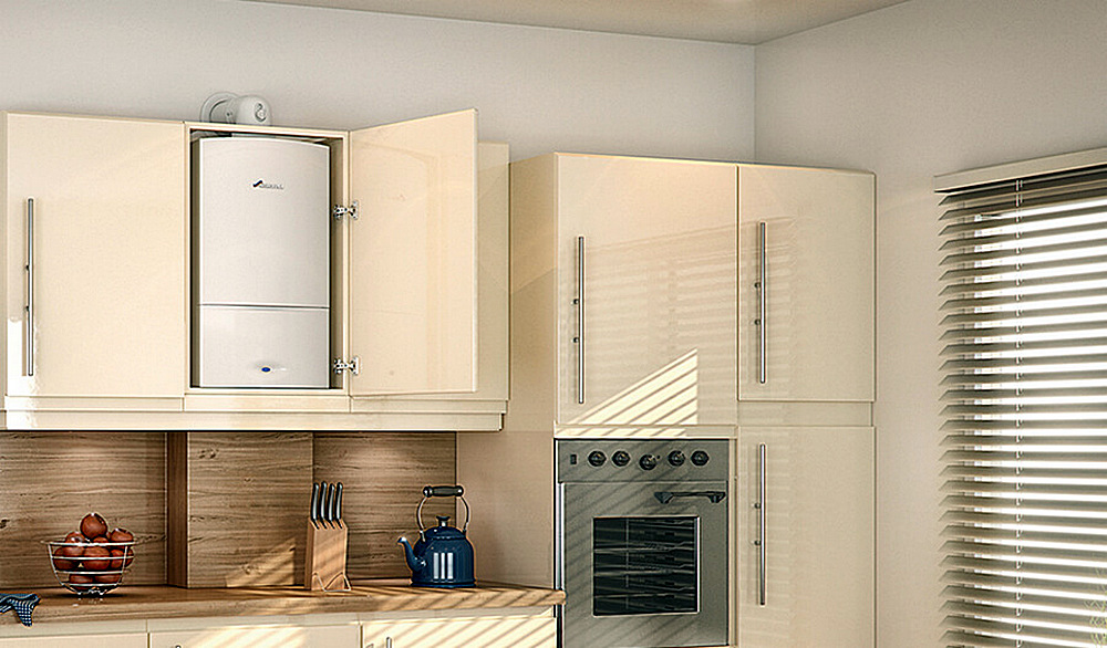 Компактный настенный газовый котел можно даже спрятать в шкафу кухонного гарнитура, если это оговорено производителем.